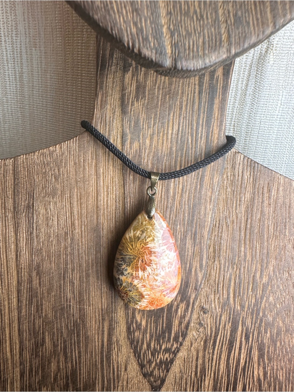 Orange and Black Coral Fossil Teardrop Pendant Necklace on Black Rope - Picture 7 of 16